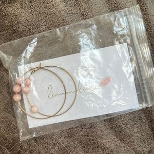 Gold hoop earrings with pink beads